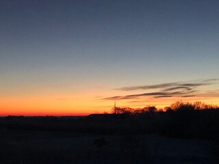 wind turbine at sunset