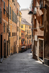 Fototapeta na wymiar A cute narrow street in Genoa Italy without people
