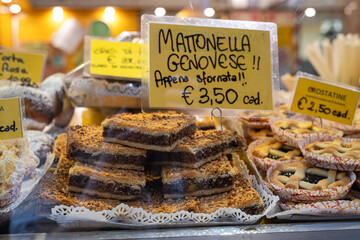 Freshly baked goods in a shop window in Genoa