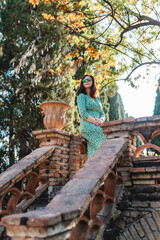 woman sitting on a bridge