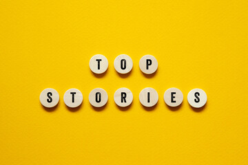 Top stories - word concept on building blocks, text