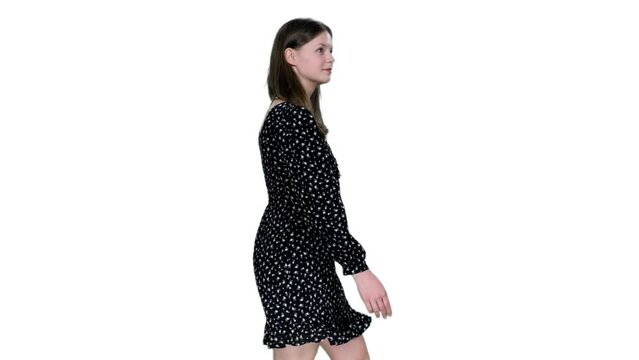 Side view young adult trendy style woman walking in short polka dot dress, Full HD footage with alpha transparency channel isolated on white background 