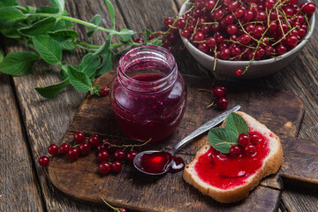 Red currant jam in a jar