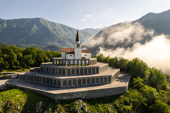 Drone view of St Anton Church and Kobarid Ossuary in Slovenia. Caporetto Memorial from First World War