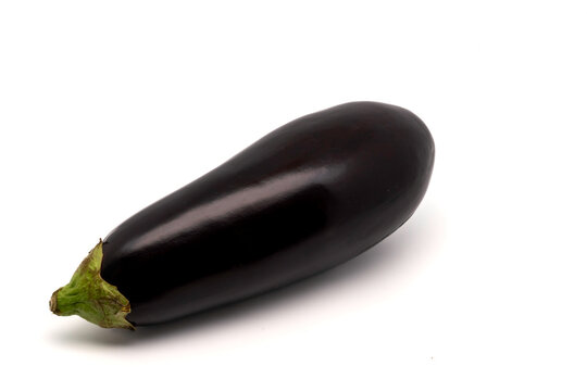 One fresh and ripe eggplant isolated on white background with copy space.