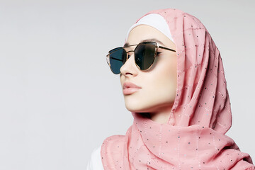 beauty girl in hijab and sunglasses.