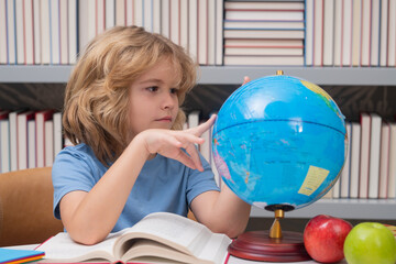 Child from elementary school with book. Little student, clever nerd pupil ready to study. First time to school. Concept of education and learning.