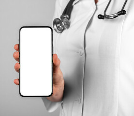 Doctor hand holding mobile phone mockup