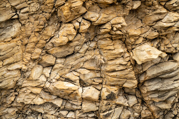 Limesrone rock wall on the beach