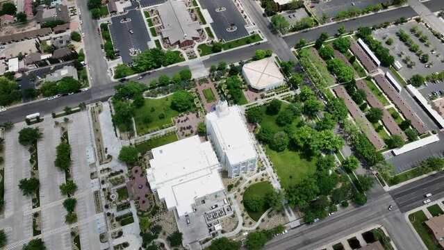 Aerial St George Utah LDS Temple full circle 3. Southwestern desert. Pioneer temple in residential area built in 1877. First LDS temple in Utah. The Church of Jesus Christ of Latter-day Saints.