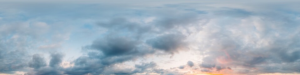 Dramatic sunset sky panorama with bright glowing red pink Cumulus clouds. HDR 360 seamless spherical panorama. Sky dome in 3D, sky replacement for aerial drone panoramas. Weather and climate change.