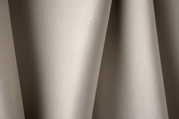 Abstract background of textured natural fabric and soft folds in beige color. Generative AI