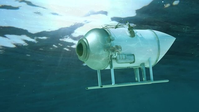 model submarine bathyscaphe concept of a swimming vehicle by type on a sunken boat Titan rotates 3d render
