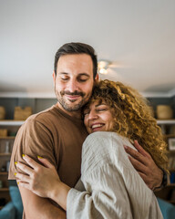 Happy couple adult caucasian man woman husband and wife dance at home