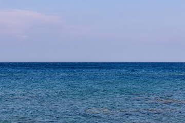 Clean mediterranian sea background horizon and blue sky