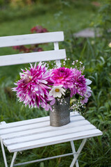 Garden Still Life With Flowers And Chair - 618285548