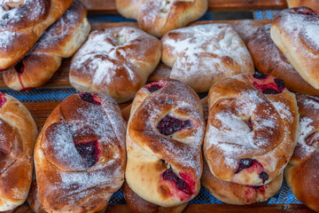 Sweet pastries on the counter. Traditional buns. Close-up.