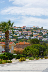 Fototapeta na wymiar Holiday resort and holiday homes on the hill in İzmir Foça (Phokai). Tourism