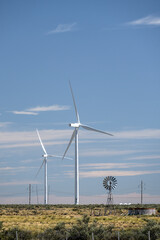 Fototapeta premium Different types of windmills. Wind power mill and traditional.