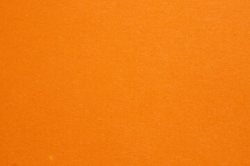 Orange paper texture background or cardboard surface from a paper. For the designs decoration and...