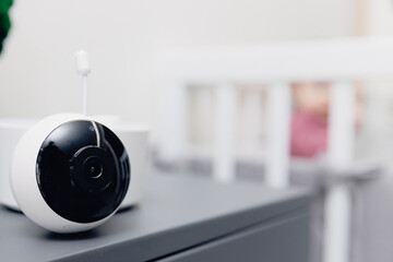 CCTV control baby, Video nanny camera near crib with child in room, white color