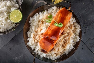 Delicious Top Close-Up of Pan-Fried Salmon Steak with Teriyaki Sauce on Steamed White Rice, Presented in 4K Visual Splendor