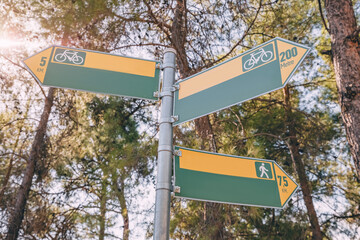 blank signpost on a hiking and cycling tourist route