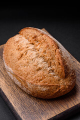 Delicious fresh baked crispy loaf of bread with seeds and grains