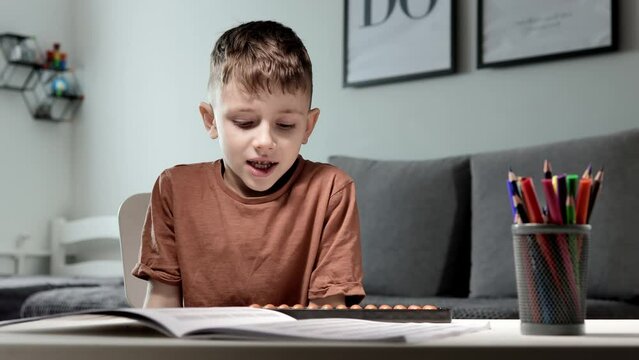 Little boy exhausted and tired of counting of mental arithmetic