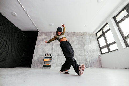 Energetic female dancer training.