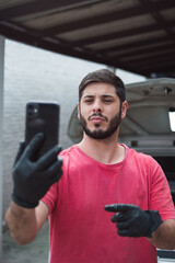 Man recording himself at car wash