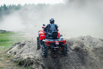 ATV, UTV, buggy, 4x4 off-road vehicle in muddy water. Extreme, adrenalin