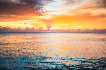 Naklejka na ściany i meble amazing sunset on the sea tropical beach