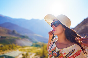 travel lifestyle headshot portrait latin american woman outdoors in the valley