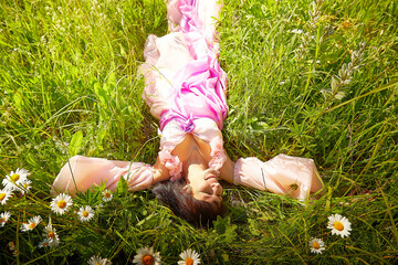 person relaxing in the grass © keleny