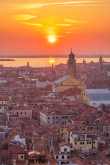 Obraz premium Top view of Venice from the St. Mark's Campanile tower at sunset, Italy, Europe.