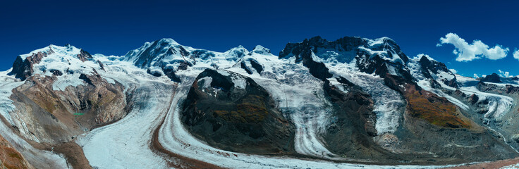 High Alps mountains with glacier panoramic view