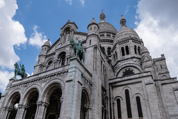 Fototapeta na wymiar Detail of Paris Basilica Sacre Coeur at top of Montmartre - Roman Catholic Church and minor basilica, dedicated to Sacred Heart of Jesus. Paris, France.