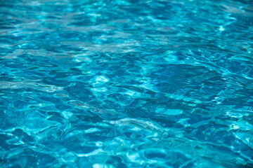 Water in swimming pool, background with high resolution. Wave abstract or rippled water texture.