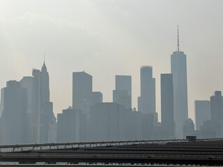 New York, United States. 29th June, 2023. The New York City skyline is covered again with smoke due to Canadian wildfires on June 29, 2023. Credit: Ryan Rahman/Alamy Live News