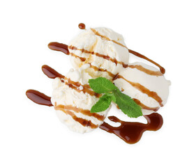 Scoops of ice cream with caramel sauce and mint isolated on white, top view