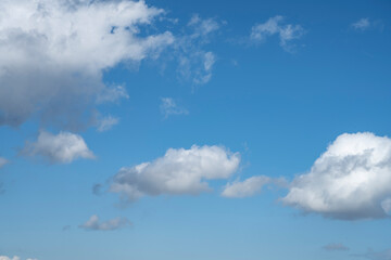White clouds in the blue sky. Sky with air clouds