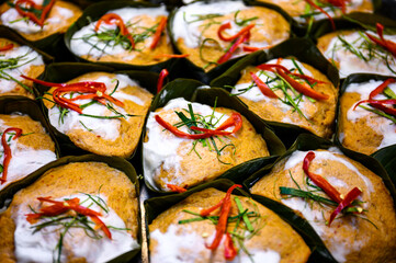 Hor Mok or steamed fish with curry paste in banana leaf cup, Thai food
