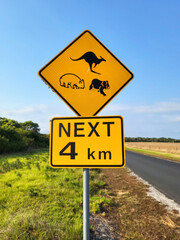 Warning road sign on Wilsons Promontory of kangaroos, koalas and wombats.