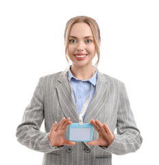 Young businesswoman with blank badge on white background