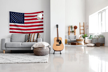 Interior of modern living room with hanging USA flag