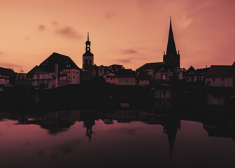 Obraz premium abstract european old town at sunset created with generative ai technology