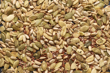 Cereal Mix of flax seeds, sesame, sunflower and pumpkin seeds close up