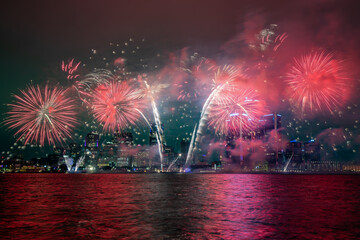 Detroit, Michigan Ford firewroks taken from Windsor, Ontario on the Detroit river with the downtown skyline visibile behind the fireworks