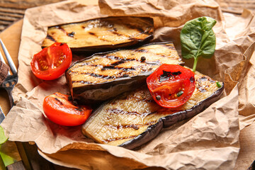Delicious grilled eggplants and tomatoes on parchment